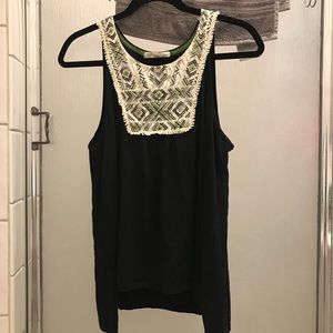 Black sleeveless blouse